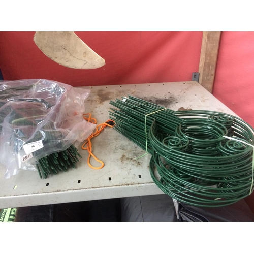 46 - A LARGE QUANTITY OF GREEN PLASTIC COATED METAL GARDEN EDGINGS