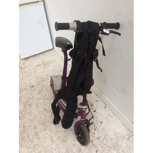 5 - A PURPLE RAZOR TWO WHEELED ELECTRIC SCOOTER AND A BABY HARNESS