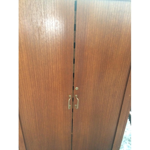 507 - A VINTAGE TEAK OFFICE FILING CABINET WITH TWO TAMBOUR DOORS AND EIGHT DRAWERS