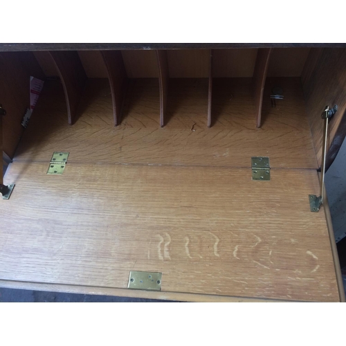 626 - AN OAK BUREAU WITH THREE SHELVES AND FALL FRONT