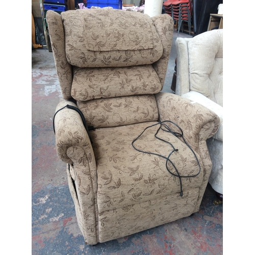 687 - A BROWN UPHOLSTERED ELECTRIC RECLINING ARMCHAIR