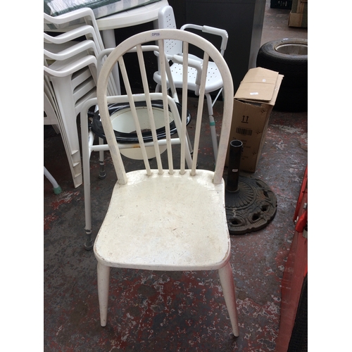 32 - FOUR ITEMS TO INCLUDE A SHOWER CHAIR, WHITE PAINTED ERCOL STYLE DINING CHAIR, AIDAPT TOILET CHAIR AN... 