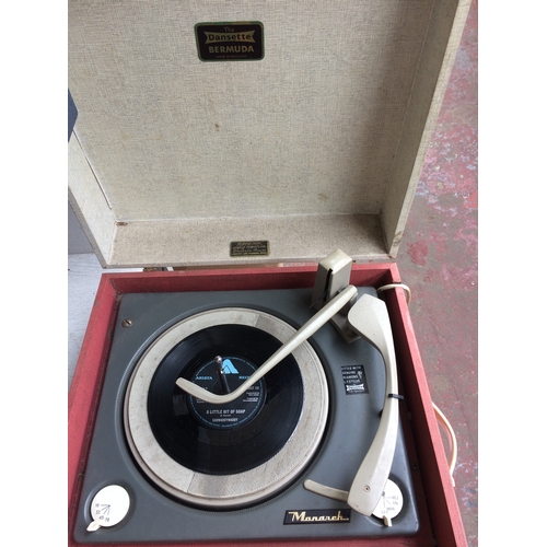 192 - A VINTAGE CREAM AND RED DANSETTE PORTABLE RECORD PLAYER