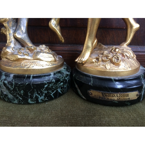 321 - A PAIR OF VINTAGE GILT METAL FIGURINES ON MARBLE BASES BY AUG MOREAU