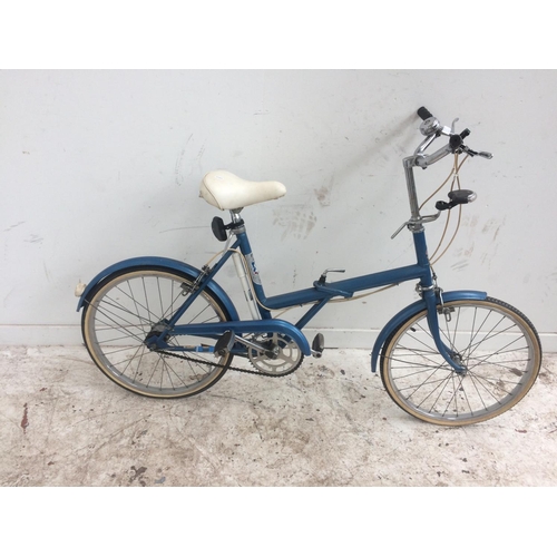 7 - A VINTAGE BLUE TRIUMPH FOLDING LADIES' SHOPPING BIKE WITH FRONT AND REAR LIGHTS AND 3 SPEED GEAR SYS... 