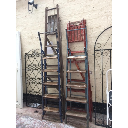 109 - FOUR SETS OF VARIOUS VINTAGE STEP LADDERS TO INCLUDE WOOD AND METAL