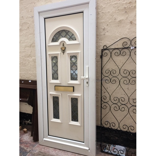 111 - A UPVC EXTERIOR DOOR AND FRAME MEASURING APPROX 81