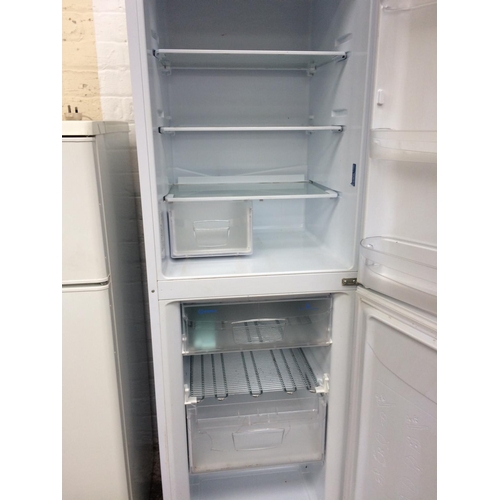 224 - A LARGE INDESIT UPRIGHT FRIDGE FREEZER (W/O)