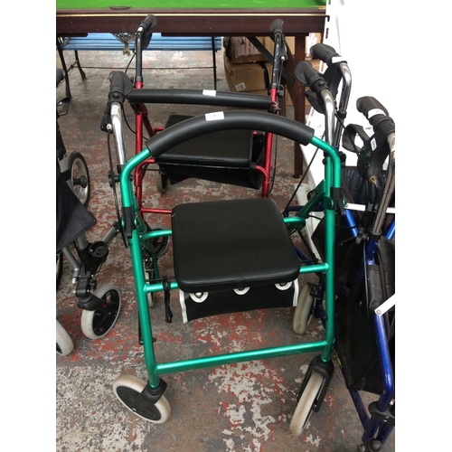 29 - TWO FOLDING FOUR WHEELED WALKING AIDS WITH BRAKES, ONE GREEN ROMA, ONE RED Z-TEC