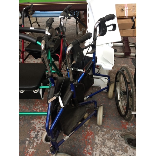 30 - TWO BLUE THREE WHEELED FOLDING WALKING AIDS WITH BRAKES