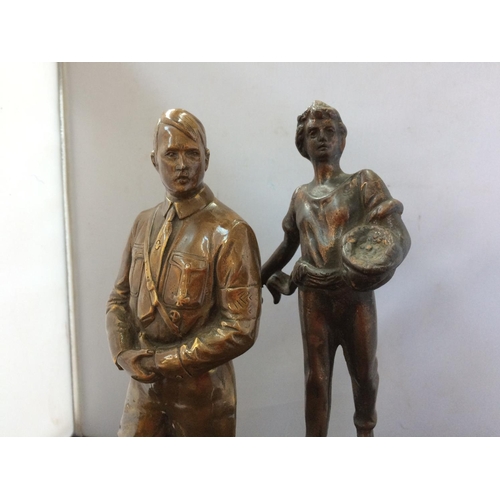 388 - TWO BRONZED FIGURINES TO INCLUDE ONE OF HITLER AND ONE OF A FARMER