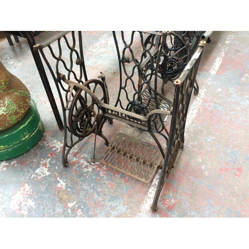 42 - A VINTAGE SINGER SEWING MACHINE CAST IRON BASE