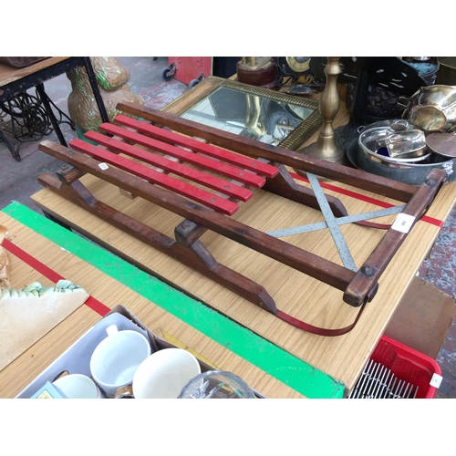 443 - A VINTAGE ENFIELD WALL CLOCK, A VINTAGE ART DECO MARBLE MANTLE CLOCK AND A VINTAGE WOODEN SLEDGE