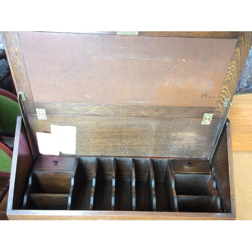 649 - AN OAK BUREAU WITH THREE DRAWERS AND FALL FRONT