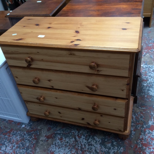 709 - A PINE CHEST OF FOUR DRAWERS