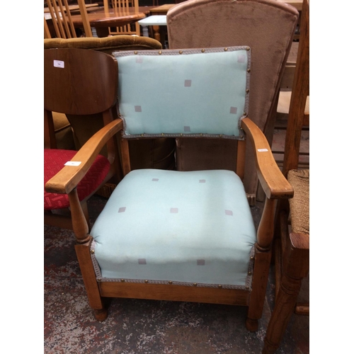 781 - A BLUE UPHOLSTERED BEDROOM CHAIR