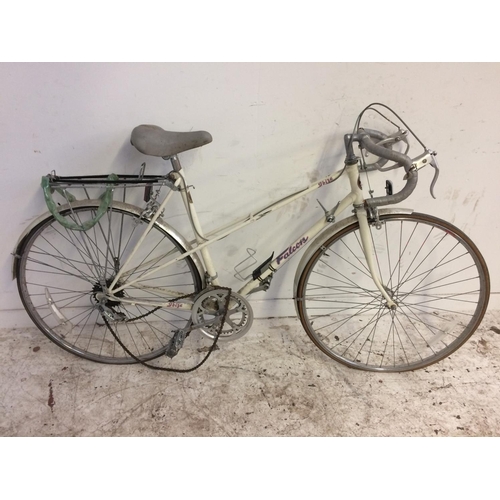 12 - A WHITE FALCON IBIZA LADIES TOWN BIKE WITH REAR CARRIER AND 10 SPEED SACHS GEAR SYSTEM