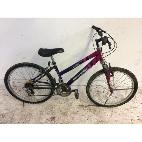 9 - A PURPLE AND BLUE EMMELLE STAR BOYS MOUNTAIN BIKE WITH FRONT SUSPENSION AND 10 SPEED SHIMANO GEAR SY... 