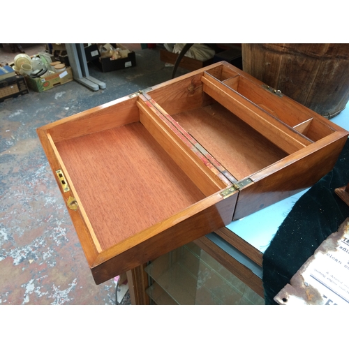 535 - A VICTORIAN WALNUT WRITING SLOPE AND AN OAK BOX