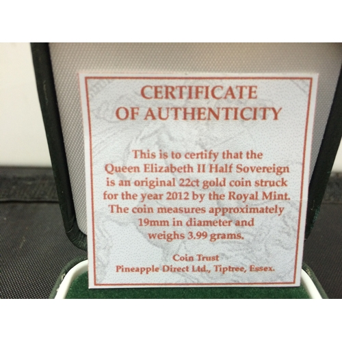 557 - A QUEEN ELIZABETH II 2012 22CT GOLD HALF SOVEREIGN WITH CERTIFICATE OF AUTHENTICITY