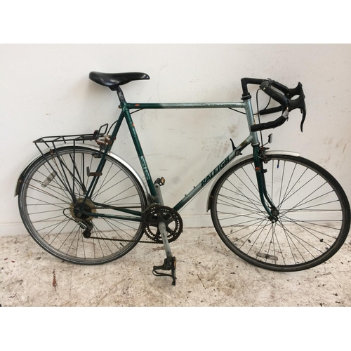 1 - A GREEN RALEIGH PRO RACE MEN'S RACING BIKE WITH QUICK RELEASE FRONT WHEEL, REAR CARRIER AND 12 SPEED... 