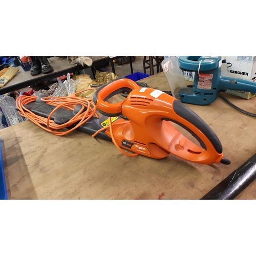 103 - AN ORANGE FLYMO HT 450 ELECTRIC HEDGE TRIMMER