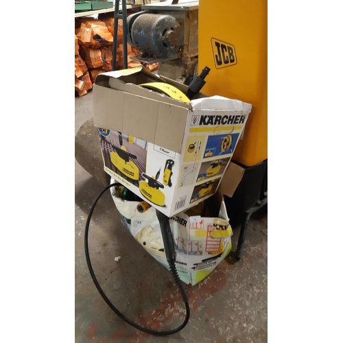 131 - A BOXED YELLOW KARCHER 210 ELECTRIC PRESSURE WITH HOSE AND LANCE