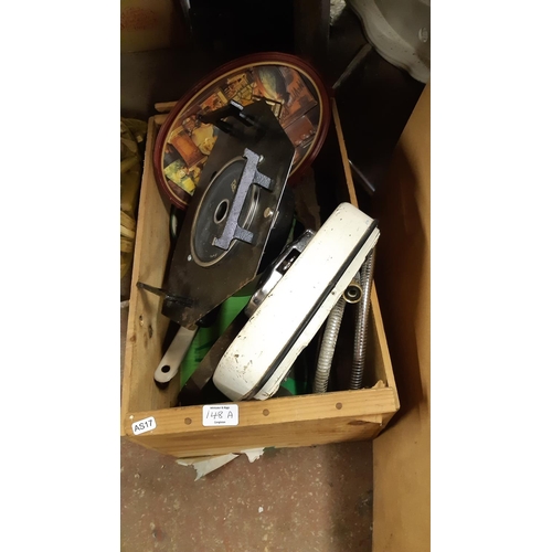 148A - A BOX CONTAINING VINTAGE TOWER BATHROOM SCALES, BENCH GRINDER WHEELS, CAST IRON BATH FEET ETC.