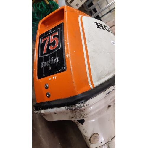 153 - AN ORANGE AND GREY HONDA 75 TWIN OUTBOARD BOAT ENGINE