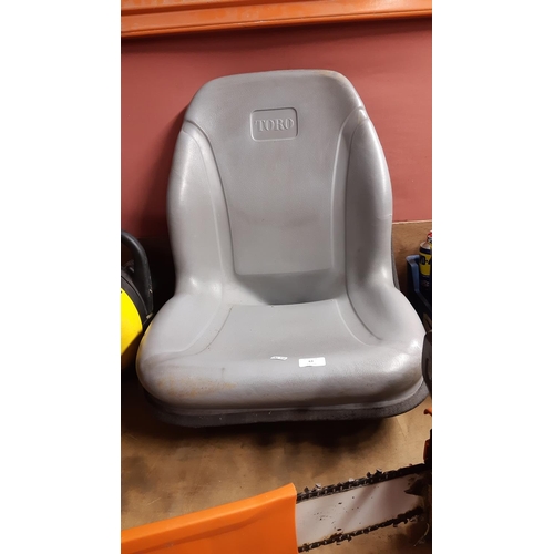 63 - A GREY TORO RIDE ON TRACTOR LAWN MOWER SEAT