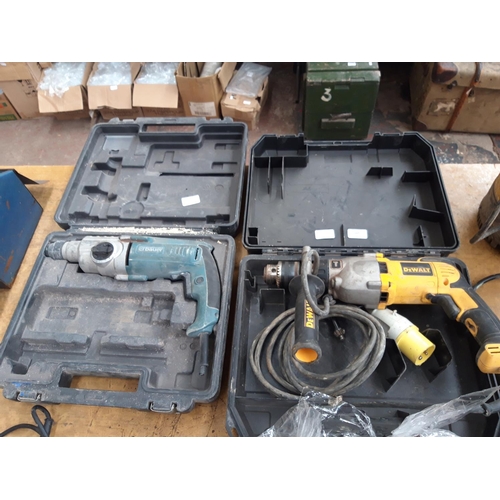 133 - TWO CASED ELECTRIC DRILLS - ONE YELLOW DEWALT D21570 110V AND ONE BLUE ERBAUER MAINS ELECTRIC (REQUI... 