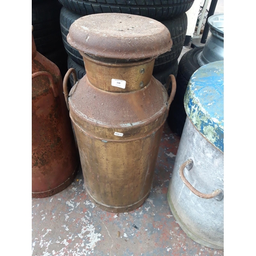 147 - A VINTAGE BRASS EFFECT MILK CHURN