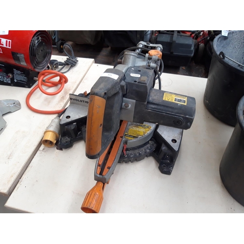 190 - A BLACK AND ORANGE EVOLUTION RAGE 110V MULTIPURPOSE SLIDING MITRE SAW