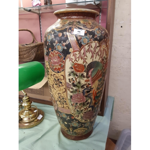 556 - A LARGE ORIENTAL STYLE CERAMIC HAND PAINTED FLOOR STANDING VASE WITH PEACOCK DESIGN - MEASURING APPR... 