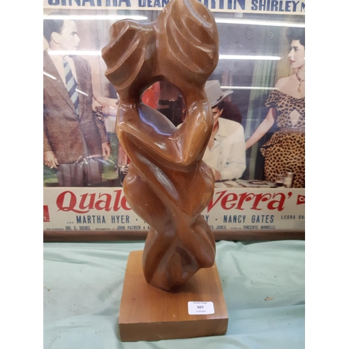 570 - A MODERN CARVED HARDWOOD NUDE COUPLE FIGURE