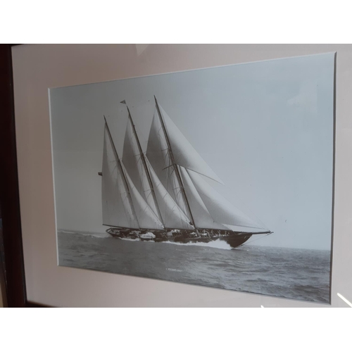 723 - THREE WALNUT FRAMED NAUTICAL BLACK AND WHITE PHOTOGRAPHS TOGETHER WITH A SKETCH OF A HARBOUR SCENE B... 