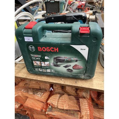 127 - TWO ITEMS TO INCLUDE A BOXED BOSCH PMF 190 E MULTI TOOL AND A BLACK & DECKER BD170T SANDER