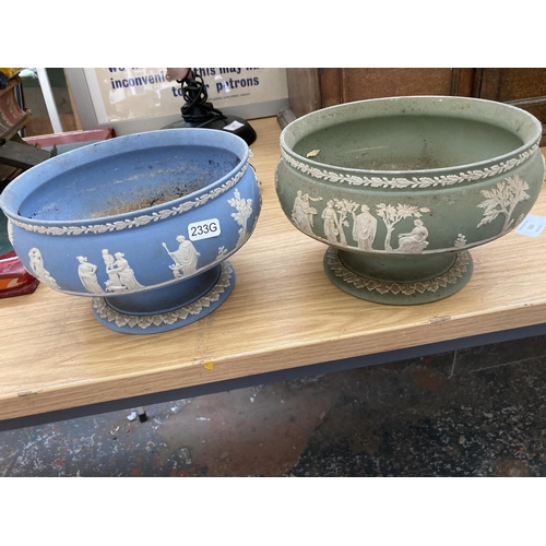 566 - TWO WEDGWOOD JASPERWARE PEDESTAL BOWLS DECORATED WITH CLASSICAL FIGURES IN WHITE RELIEF, ONE PALE BL... 