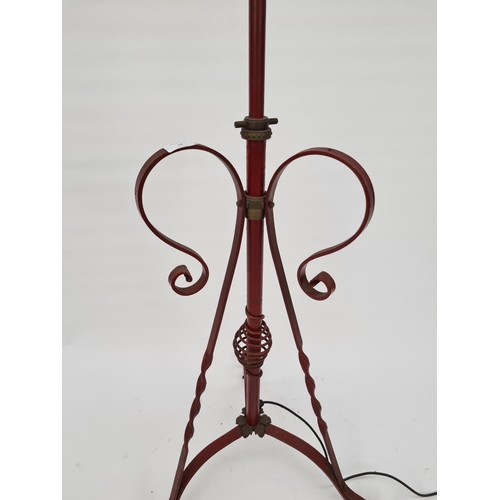 40 - A 20TH CENTURY RED PAINTED WROUGHT IRON STANDARD LAMP ON ELABORATE TRIPOD BASE WITH BRASS DETAILS - ... 