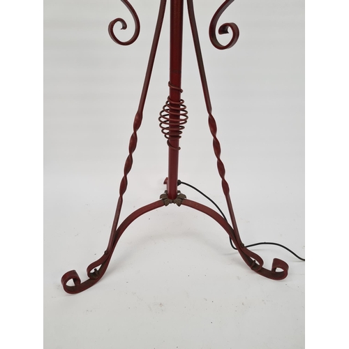 40 - A 20TH CENTURY RED PAINTED WROUGHT IRON STANDARD LAMP ON ELABORATE TRIPOD BASE WITH BRASS DETAILS - ... 