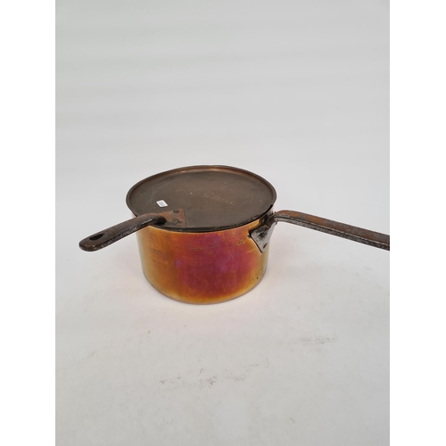 63 - A LARGE ANTIQUE COPPER SAUCEPAN WITH IMPRESSED H.D.P MARK, STEEL HANDLE AND SIMILAR LID WITH F.LAMBE... 