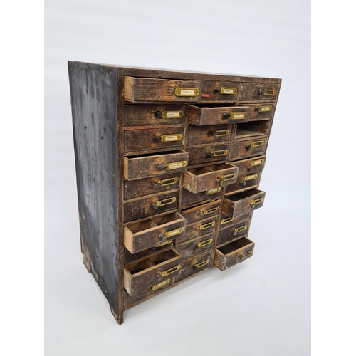 26 - AN EARLY 20TH CENTURY PINE THIRTY DRAWER ENGINEERS/WATCHMAKERS CABINET - MEASURING APPROX. HEIGHT 58... 