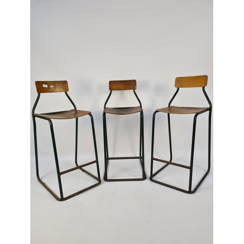 1 - A SET OF THREE 1950'S FACTORY WORK STOOLS WITH GREEN TUBULAR METAL FRAMES AND PLYWOOD SEATS AND BACK... 