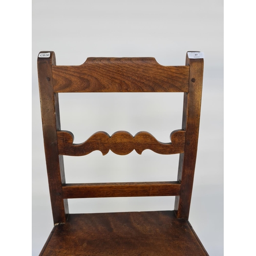 58 - AN 18TH CENTURY ELM AND OAK COUNTRY SIDE CHAIR WITH LOWER STRETCHERS AND CARVED MOUSTACHE BACK - MEA... 