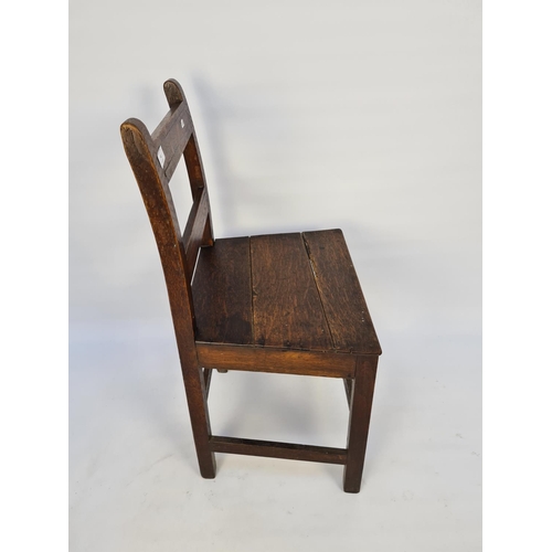 57 - AN 18TH CENTURY OAK COUNTRY SIDE CHAIR WITH LOWER STRETCHERS - MEASURING APPROX. HEIGHT 83CM, WIDTH ... 