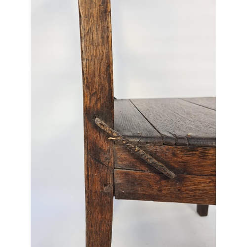 56 - AN 18TH CENTURY OAK COUNTRY SIDE CHAIR WITH LOWER STRETCHERS - MEASURING APPROX. HEIGHT 83CM, WIDTH ... 