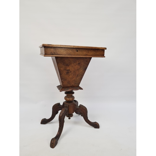 70 - A VICTORIAN HEAVILY CARVED BURR WALNUT SEWING BOX ON QUATREFOIL BASE WITH SECTIONED INTERIOR AND LAT... 