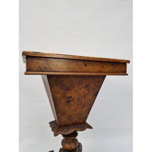 70 - A VICTORIAN HEAVILY CARVED BURR WALNUT SEWING BOX ON QUATREFOIL BASE WITH SECTIONED INTERIOR AND LAT... 