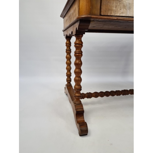 67 - A VICTORIAN WALNUT WRITING TABLE WITH SINGLE DRAWER AND BOBBIN TURNED LEGS AND LOWER BOBBIN STRETCHE... 