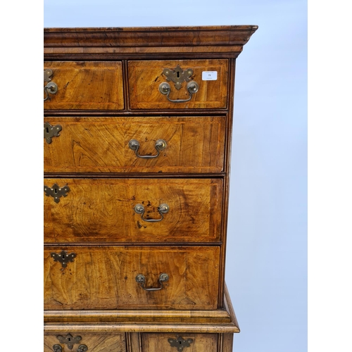 66 - AN EARLY 18TH CENTURY QUEEN ANNE WALNUT CHEST ON STAND WITH HERRINGBONE BANDING TO DRAWERS, SOLID WA... 